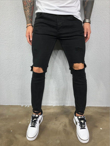 SKINNY RIPPED JEANS